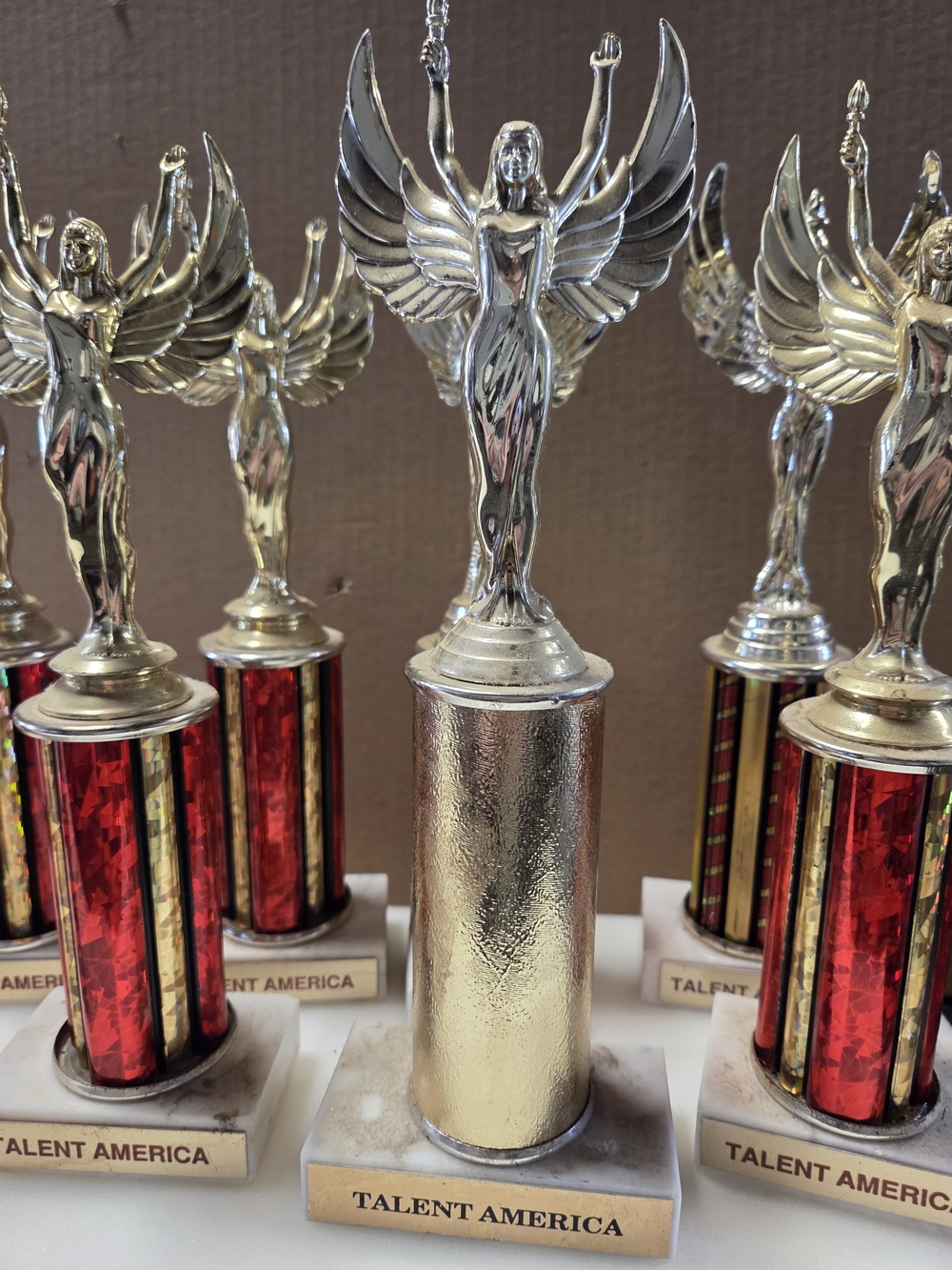 8 PCS Gold Winged Trophys with Red Column Accents 1ST PLACE GOLD 7 PCS RED